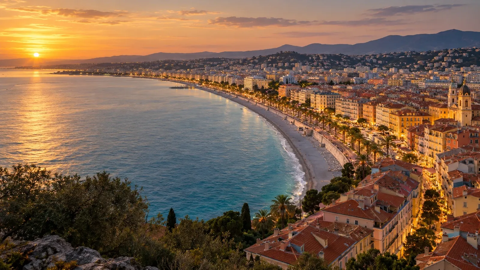 Promenade des Anglais and the Baie des Anges at sunset